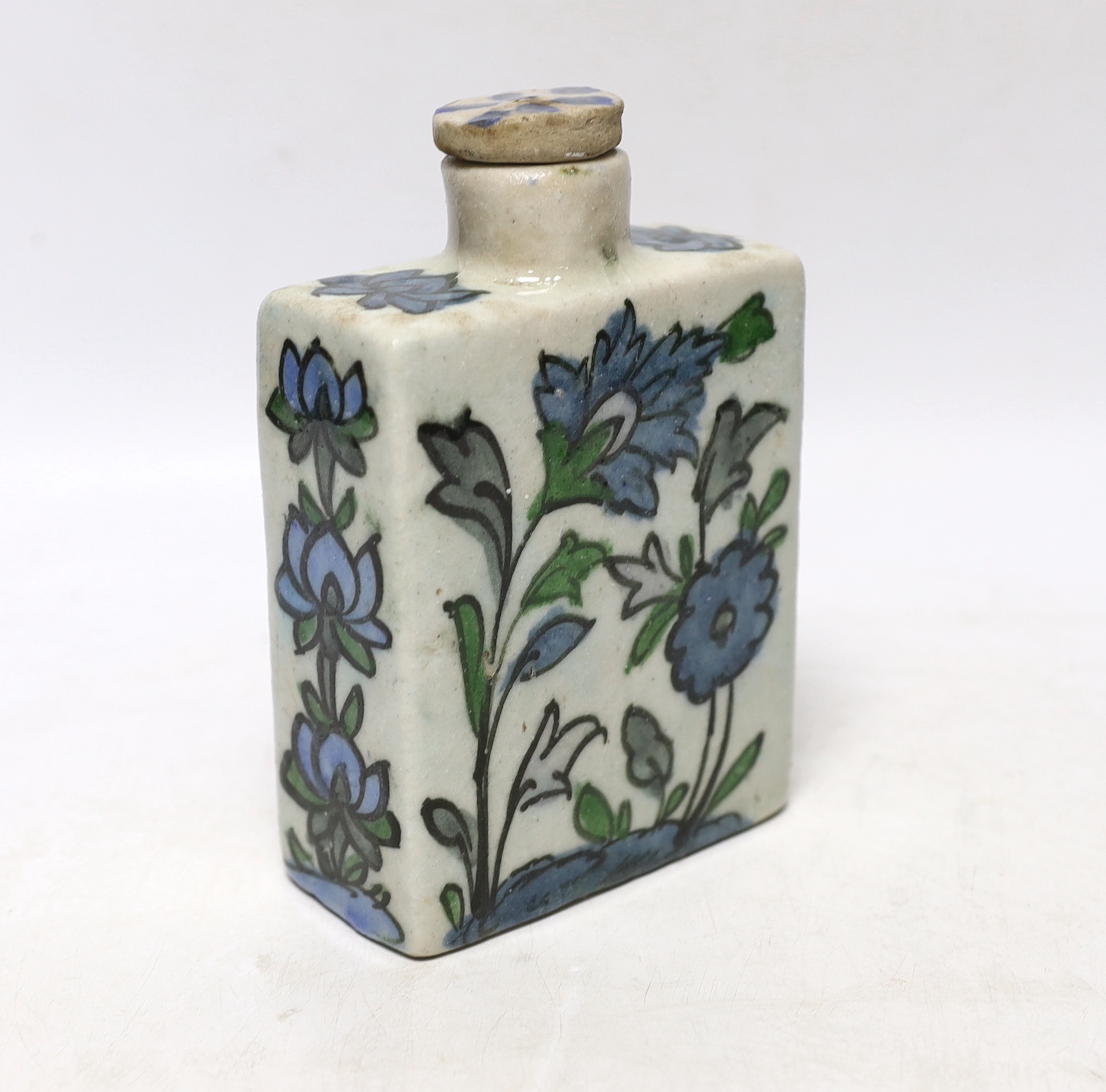 An Iznik tin-glazed pottery flask and cover, 15cm